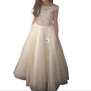 Tiffany Designs ball gown. Girls size 12. Gold and AB stone beading on top.